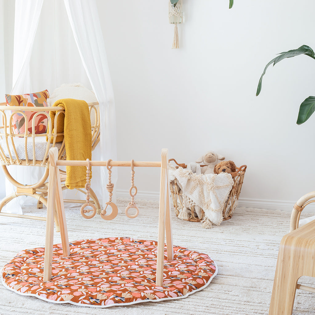 Nursery scene featuring padded play mat