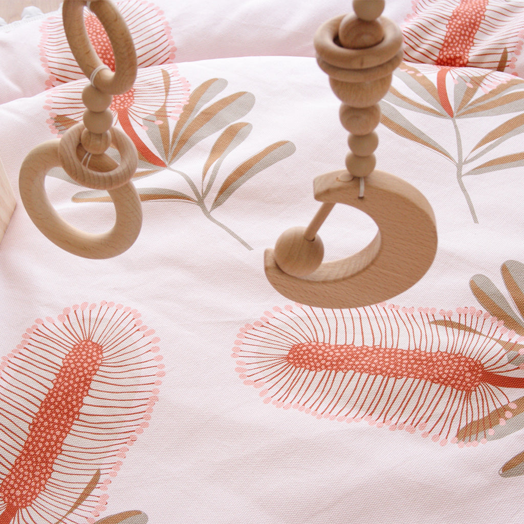 Close up detail of pink callistemon play mat